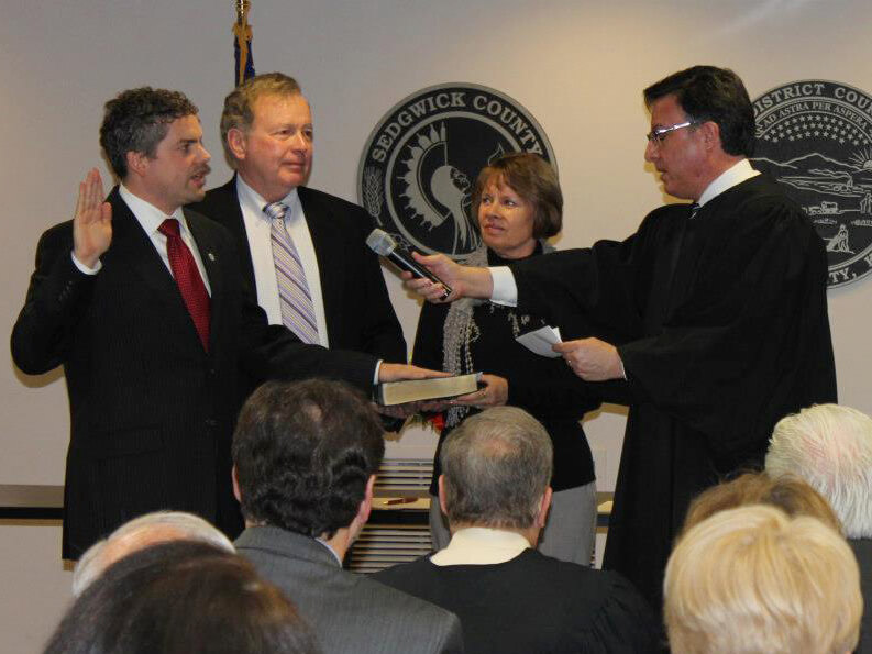 Kelly taking the oath of office for Sedgwick County Clerk