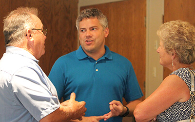 Kelly speaking with constituents